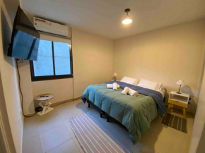 Moderno y nuevo apartamento con cochera en el centro